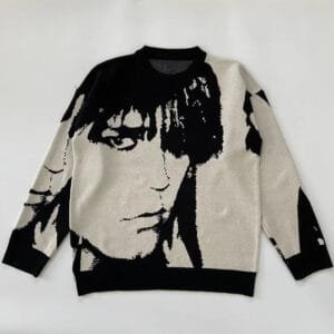 Pull Créatif En Crème Et Noir Avec Visage Abstrait, Tendance Et Unique.