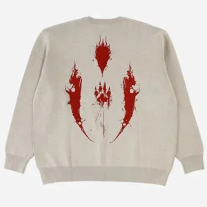 Sweatshirt Beige Avec Design Graphique Rouge Audacieux Pour Un Style Moderne Et Décontracté.