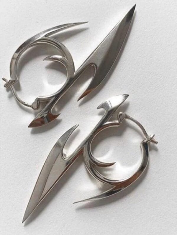 Boucles Doreilles Contemporaines En Argent, Alliant Élégance Et Audace Pour Toutes Les Occasions.