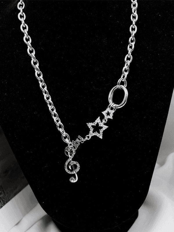 Collier Élégant En Argent Avec Charme De Clef De Sol Et Étoile Scintillante.