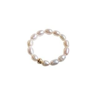 Bracelet en perles élégantes avec accent doré, parfait pour toutes les occasions.