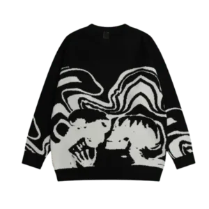 Pull Noir Et Blanc Avec Figures Stylisées Et Motifs Abstraits, Parfait Pour Un Style Contemporain.