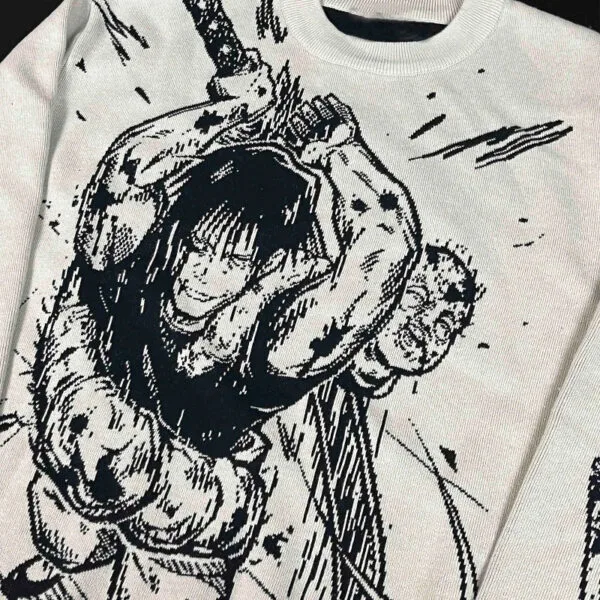 Sweatshirt Noir Et Blanc Avec Design Dynamique Inspiré Du Manga Et De Lanimation.