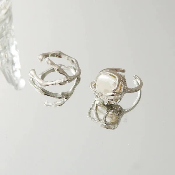 Anneaux En Argent Raffinés : Élégance Intemporelle Et Design Artistique Moderne.